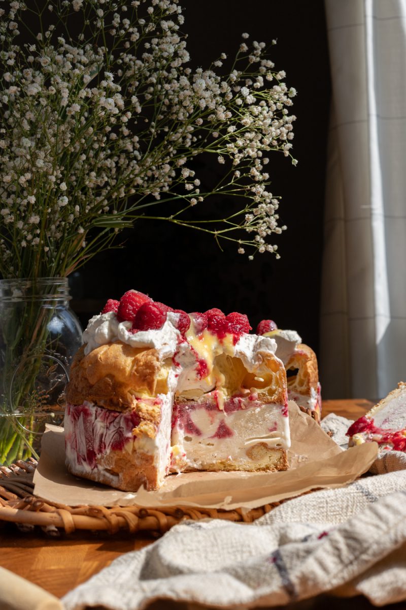 Cross-section of the lemon raspberry cream puff ice cream cake.