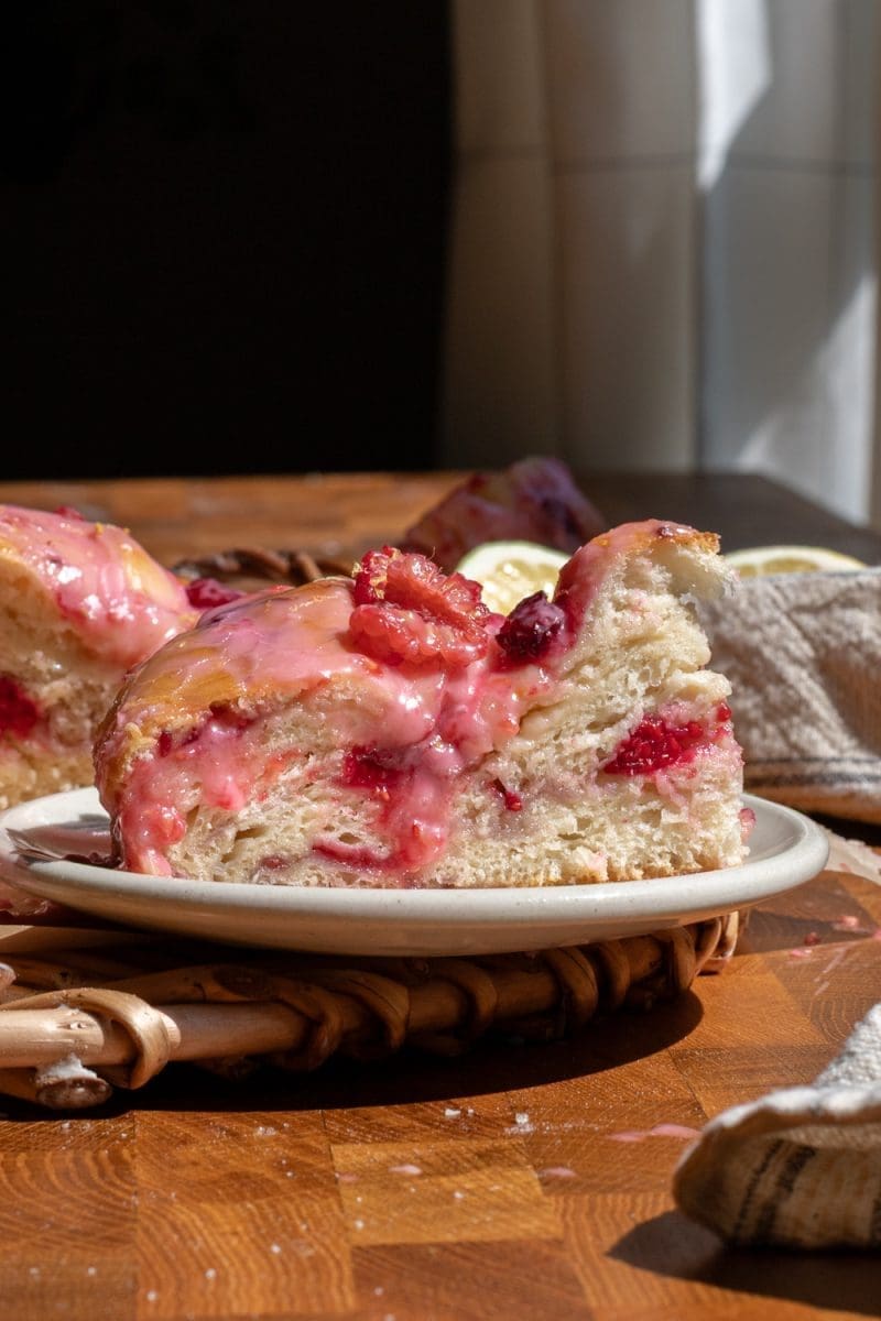A slice of the giant lemon raspberry brioche bun.