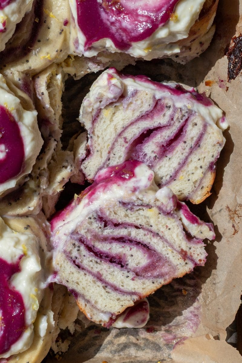Close-up cross section of the blueberry lemon poppy seed rolls.