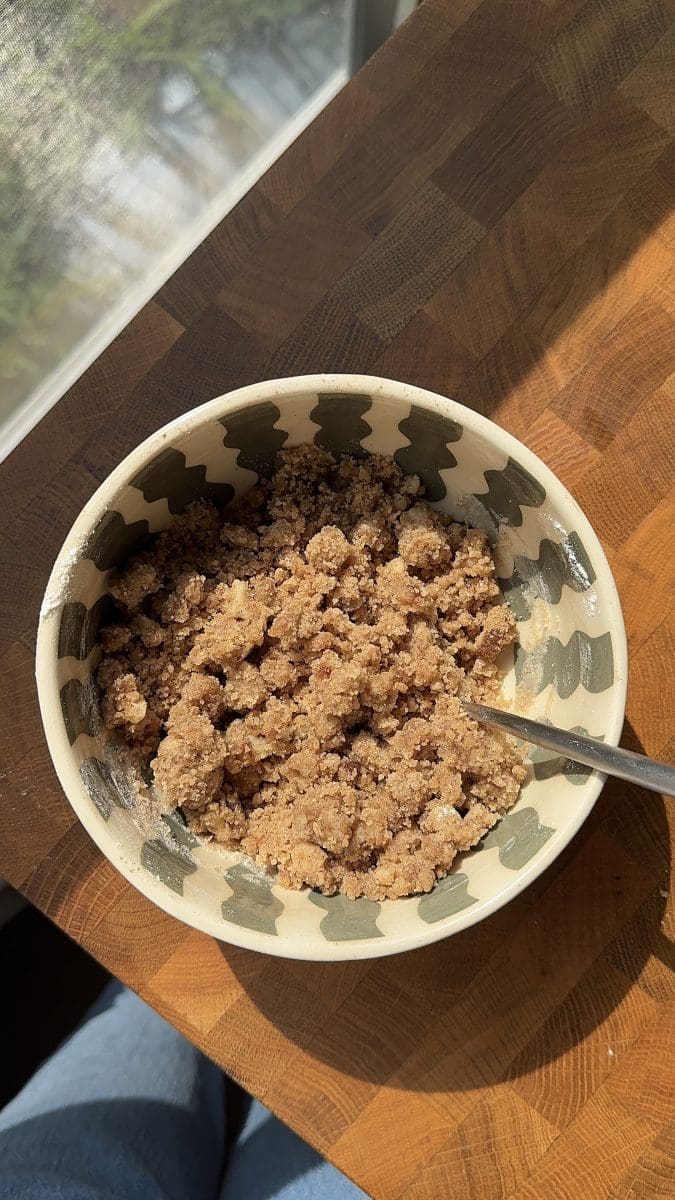 Cinnamon streusel in a small mixing bowl.