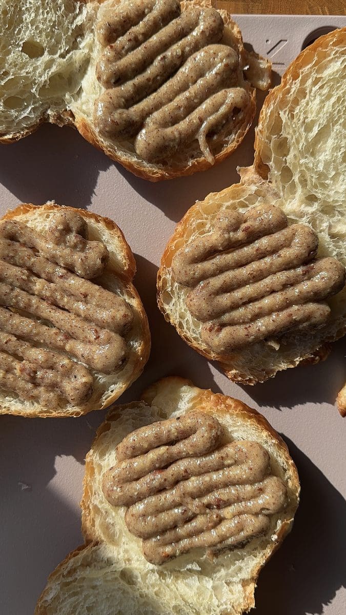 Frangipane piped on the croissants.