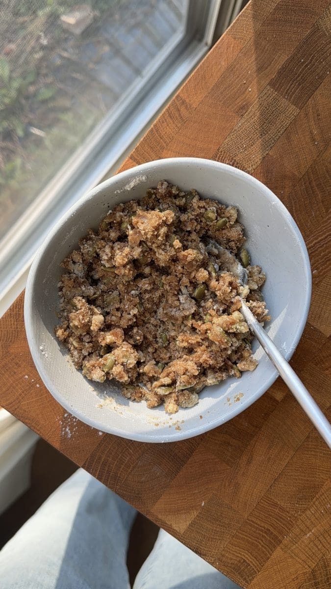 Pepita streusel in a mixing bowl.